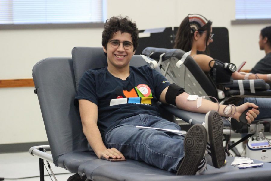 Junior Adam Tamimi participating in this years blood drive during third period.