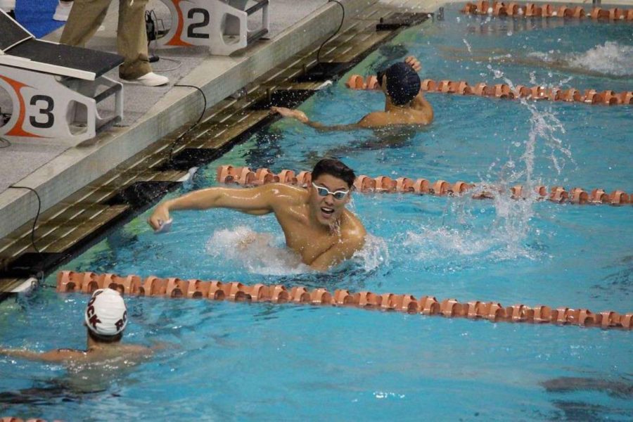 Senior Brandon Wong at his district meet, realizing that he broke the school record.