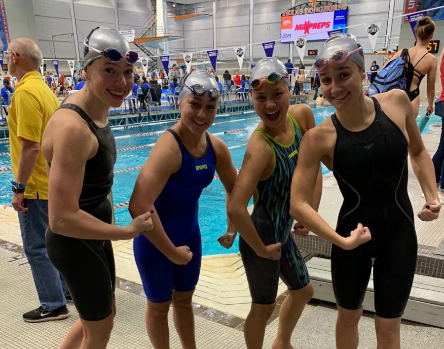 Nguyen, Orris, Lelinski and Roberto pose for the camera before their relay. 