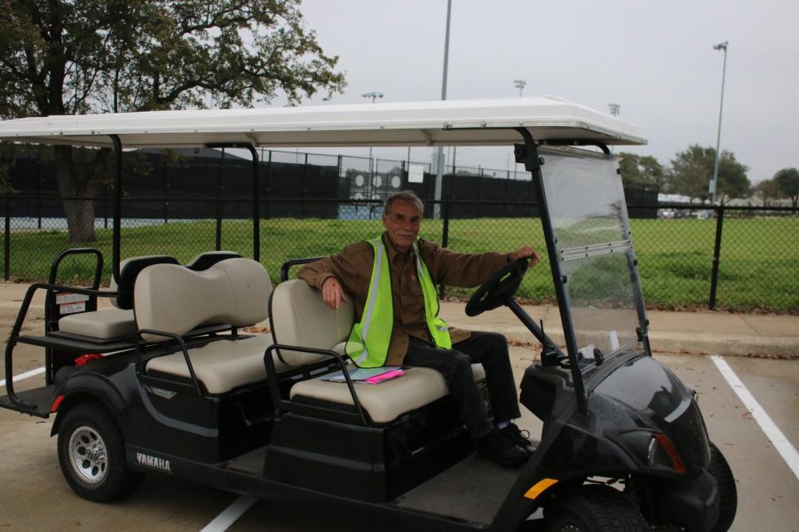 Parking attendant Kevin Montague patrols the lot during third block. 