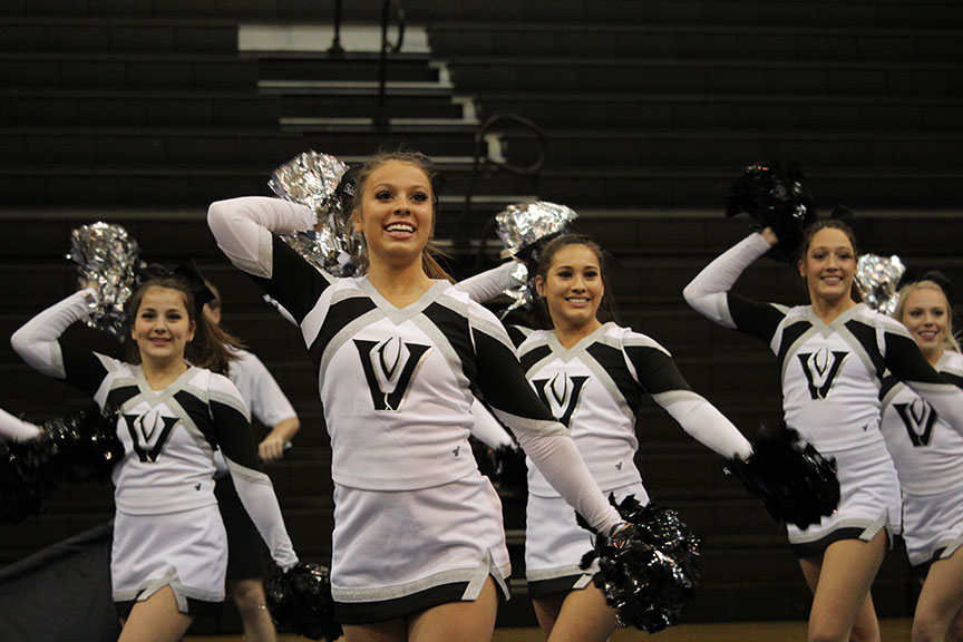 The cheer team performs a showoff in the gym on Jan. 13 before their UIL contest