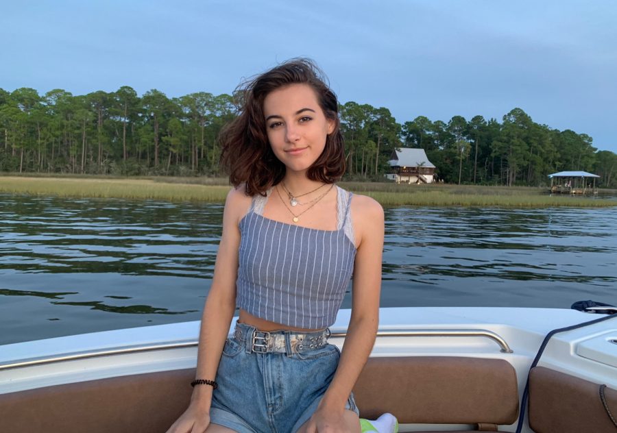 Joseph rides in new family boat on lake in Santa Rosa, Florida