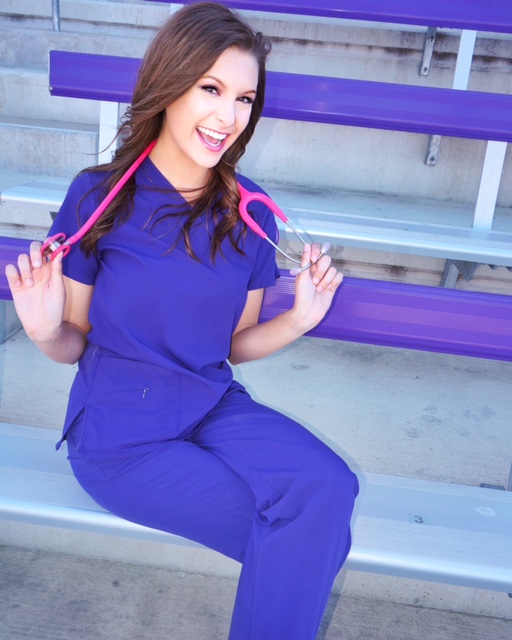 Hayley+Walz+poses+and+smiles+in+her+nursing+gear+after+her+college+graduation