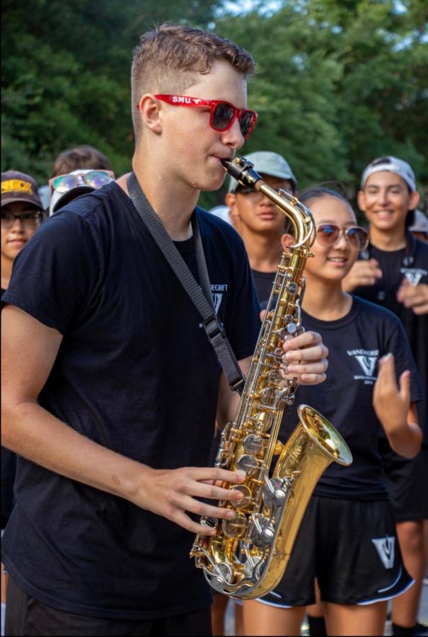 Junior Eric Parmelee playing his favored instrument, the alto-  saxophone 