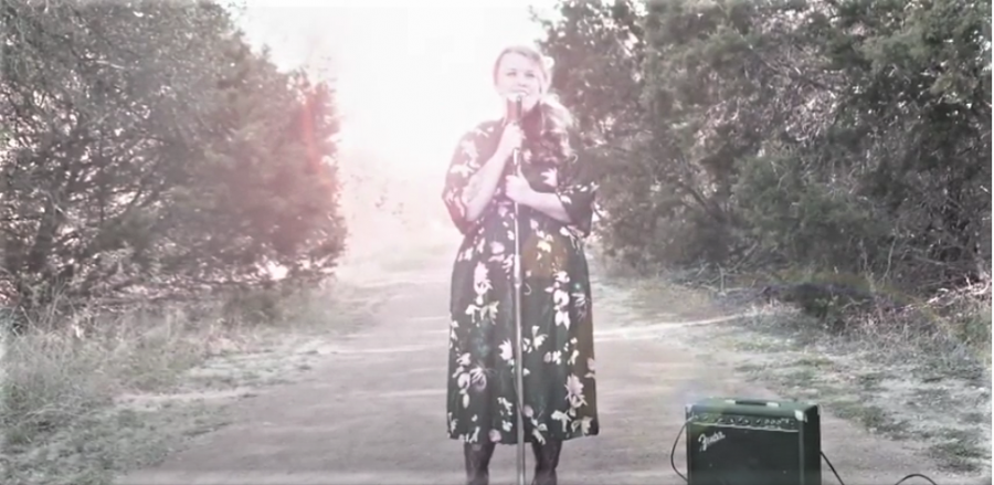 Theatre teacher, Celeste Schneider, sings in her first music video to the song I Never Knew.