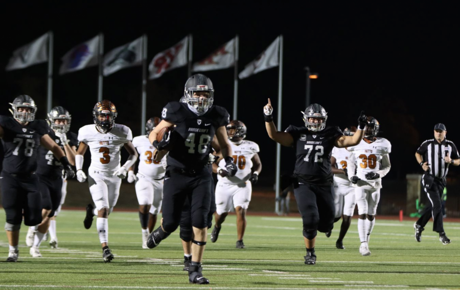 Senior Tommy Hartman runs towards the end zone scoring his first Viper touchdown against Hutto.