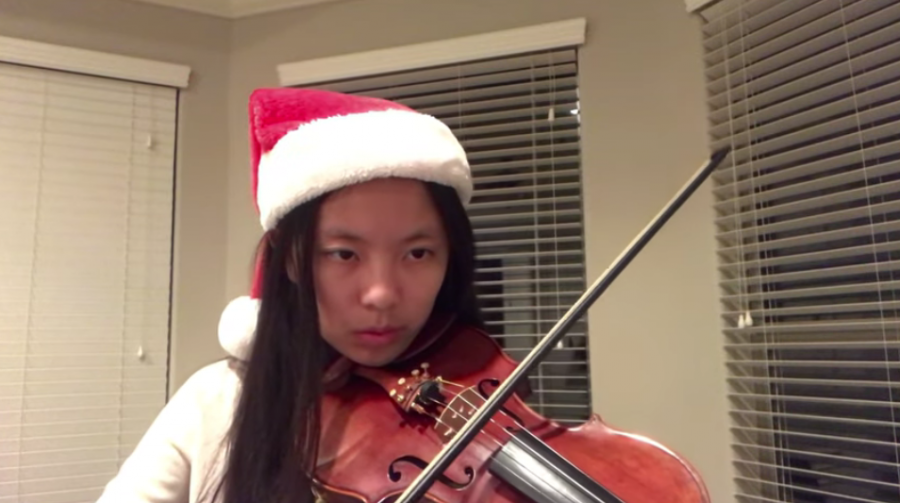 President of the Vandegrift Musicians club, Karen Li, performs  the song Greensleeves on the violin in their December project.
