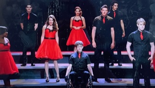Some members of the Glee Club performing 'We are the Champions' in Season 3 episode 21