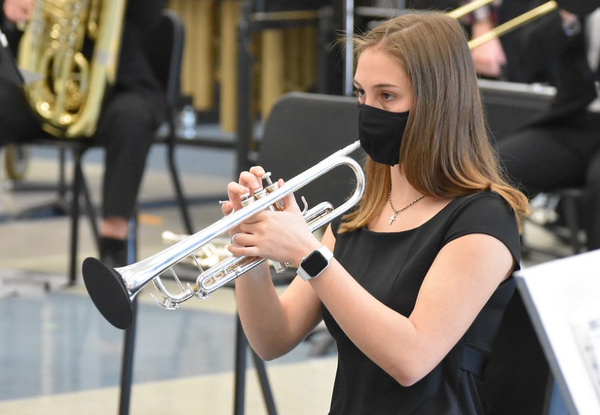 Sophomore Treasa Connors performs with her ensemble during the sight reading portion of the contest