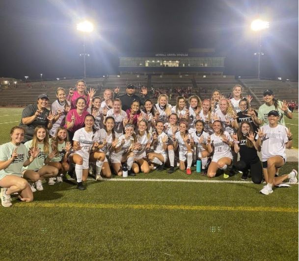 The girls soccer team after winning the 6th game of the playoffs.