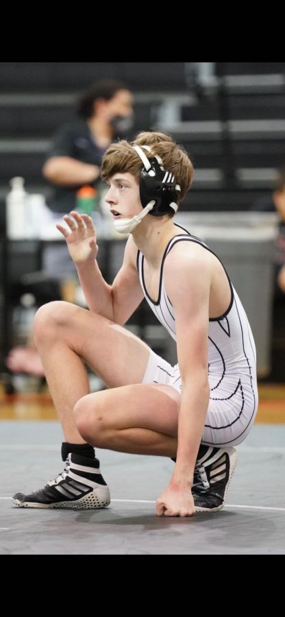 Junior Zane Farone prepares for his next wrestling match.