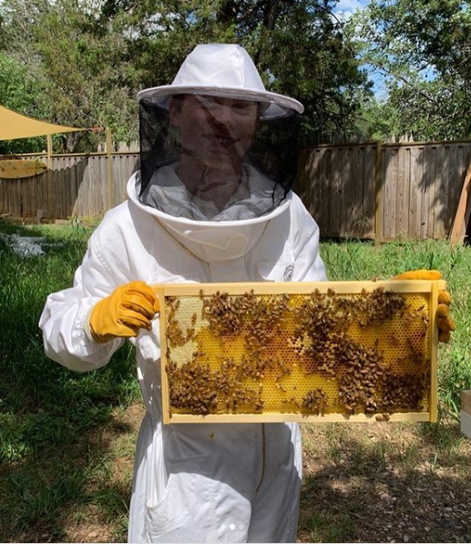 Alexander Beaucamp, who took first place at the Entomology Area competition, with the bees he takes care of at his home.