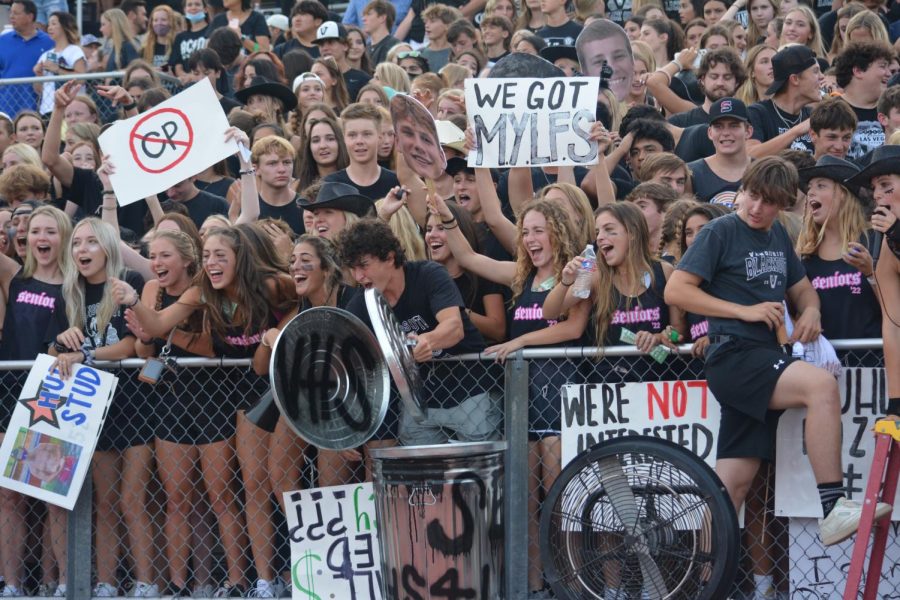 The Vandegrift student section celebrates together at the first football home game which was against Cedar Park High School. 