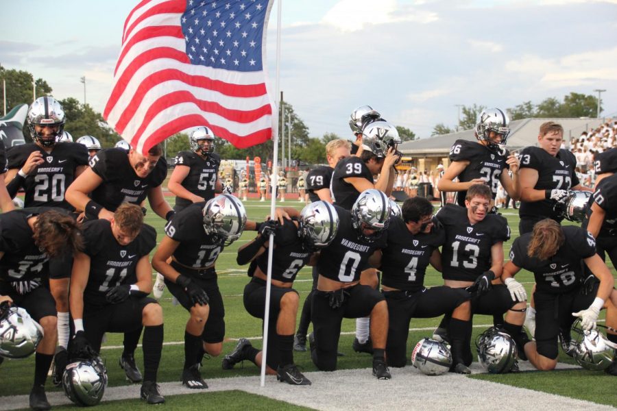 Varsity football players ready to give it all the first game and take home a win