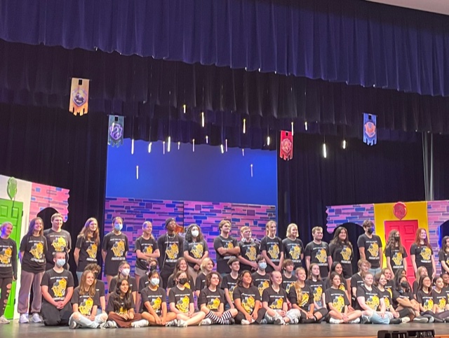 The cast and crew of "Puffs" gather together for a group picture before rehearsal