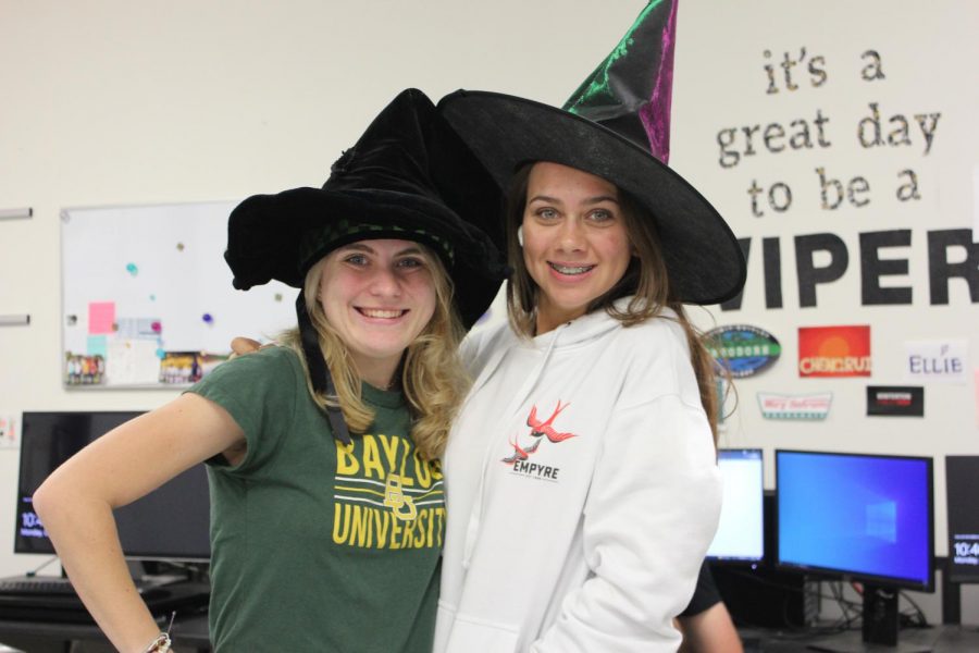 Seniors Karissa Gonzales and Taylor Chronert dress up for Twin Day together by wearing witch hats.