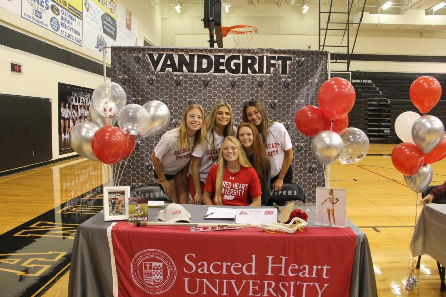 Sadie Stevens smiles with all her friends around her, supporting her with her commitment