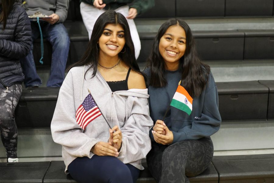 Club of India members wave their flags as they represent their club