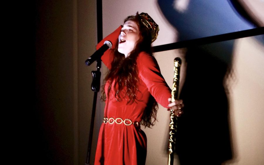 Dressed like royalty, senior Raine Collier performs the song “You’ll Be Back” from the musical Hamilton during Broadway night Nov. 16. Collier was one of 14 students who traveled to San Antonio for choir All-State auditions.