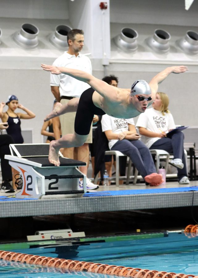 At district on Jan. 28 at UT, senior Karsten Olsen and the swim teams compete for a regionals appearance.  Olsen went on to finish fourth at regionals in the backstroke.