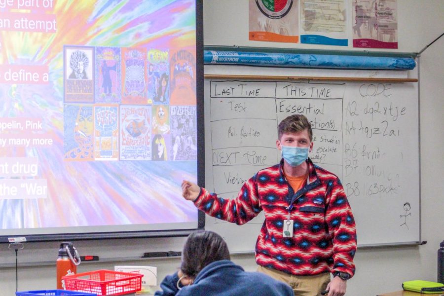 Government teacher River Wylie gives a presentation for his class.