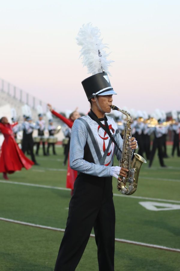 Inbo+Shim+performs+his+saxophone+at+the+varsity+football+game+against+Westwood+on+Oct.+22.+Shim+traveled+to+San+Antonio+in+early+February+to+the+All-State+TMEA+Convention