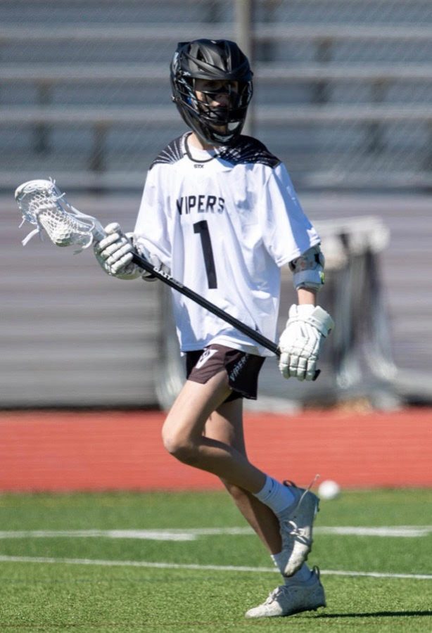 Freshman Matt D. Playing Lacrosse 