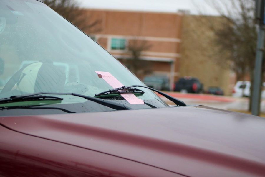 A student car gets a ticket.