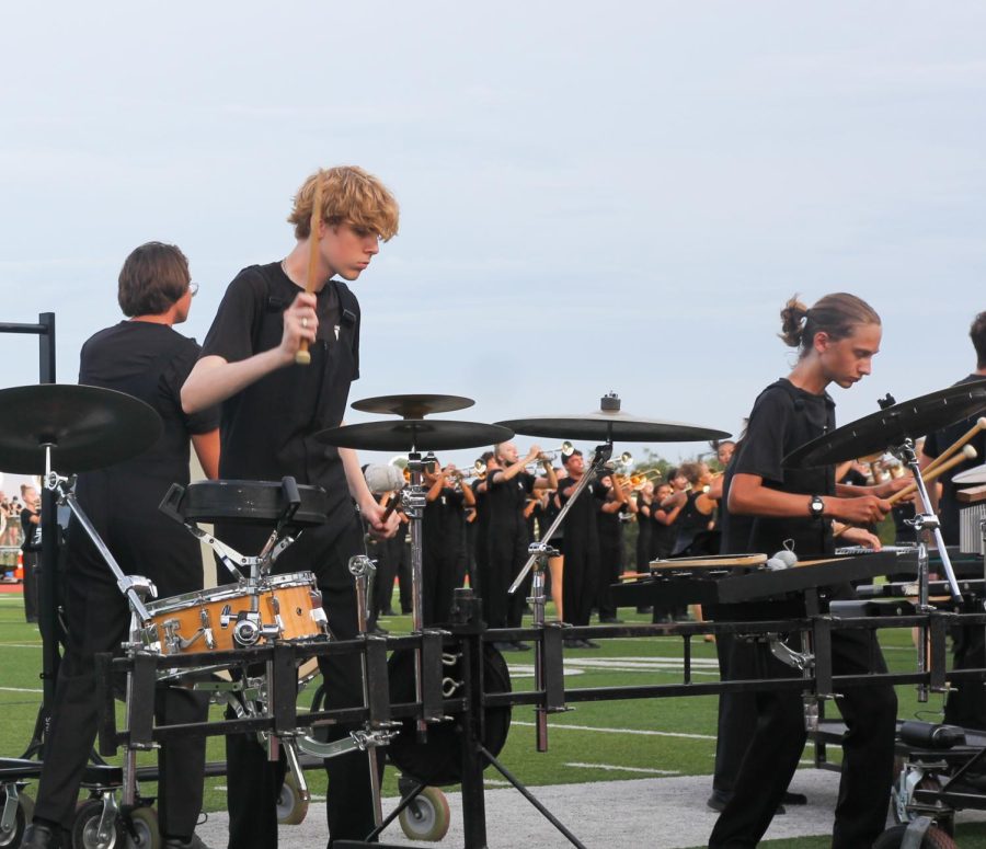 Band members practice earlier this year for an upcoming show