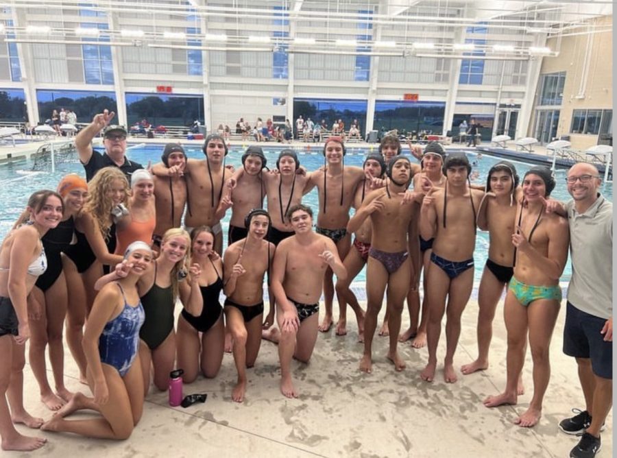 Water+polo+poses+for+team+photo+at+competition+in+Round+Rock.