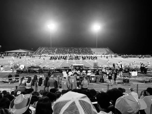 Students+fill+the+stadium+for+a+football+game.+At+Monroe+Stadium%2C+the+football+team+will+play+their+homecoming+game+against+Vista+Ridge+on+Oct.+28.+