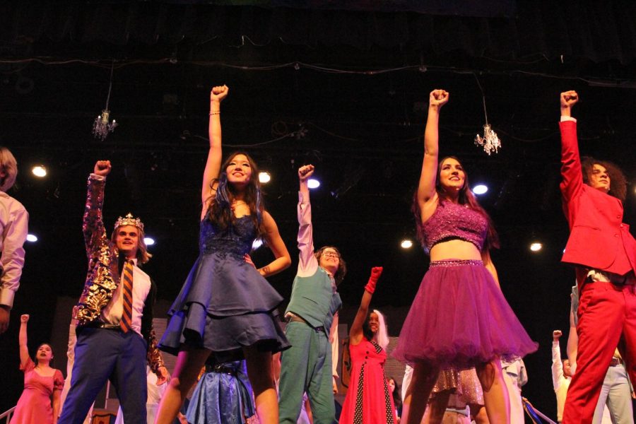 Striking their final pose, the cast closes the performance with their final act.