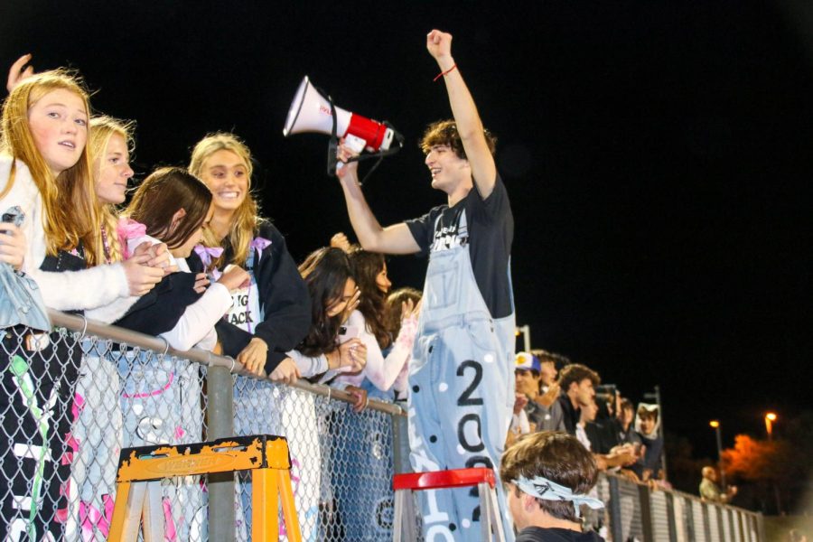 Sims sings along to music during the game to boost the crowd.