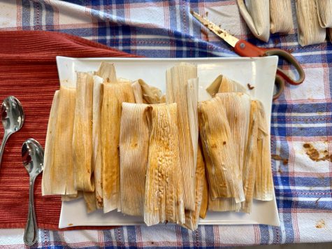 A batch of tamales waits in the assembly line to be cooked.
