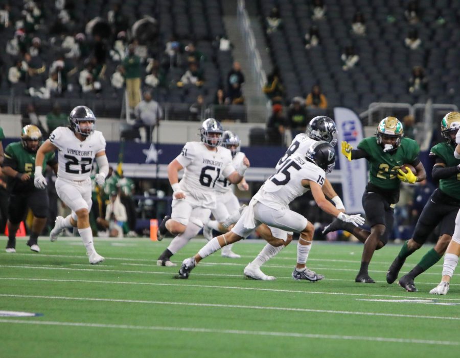 Coming up to help, senior defensive back Isaiah Thompson tracks down the DeSoto runner.