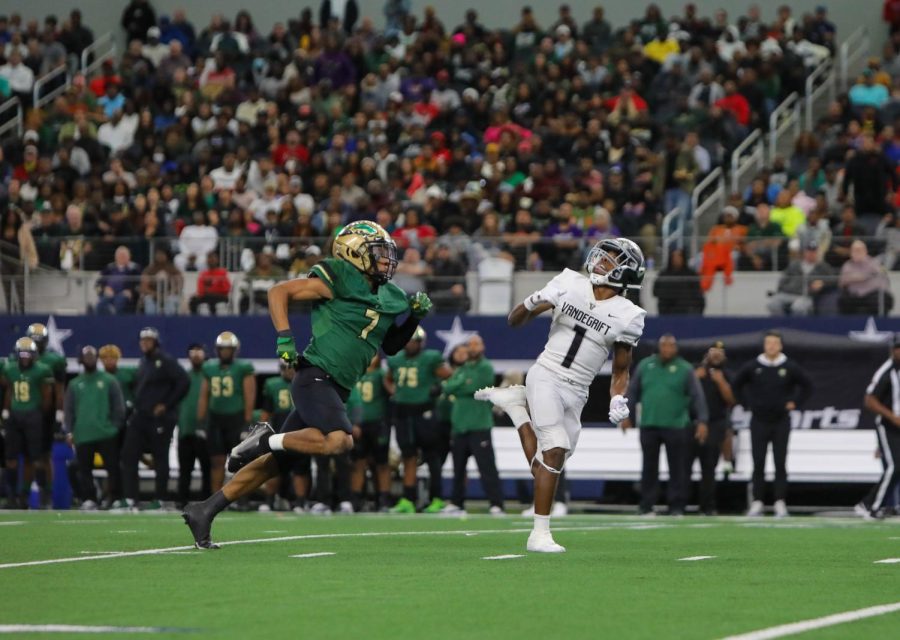 A pass from senior quarterback Brayden Buchanan looks deep for junior wide receiver Miles Coleman.