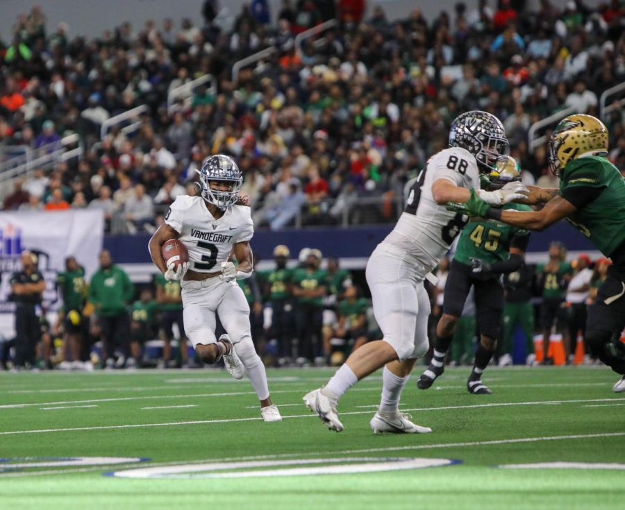 Handling the returns, senior RayJean Middleton races past the 20-yard line.