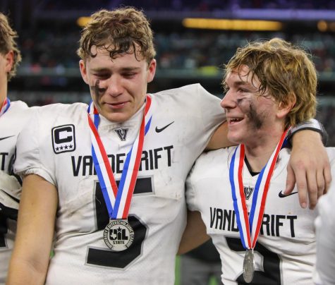 Seniors Brayden Buchanan and Hudson Lilie try to enjoy the moment as they face their families, friends, and fans one last time.