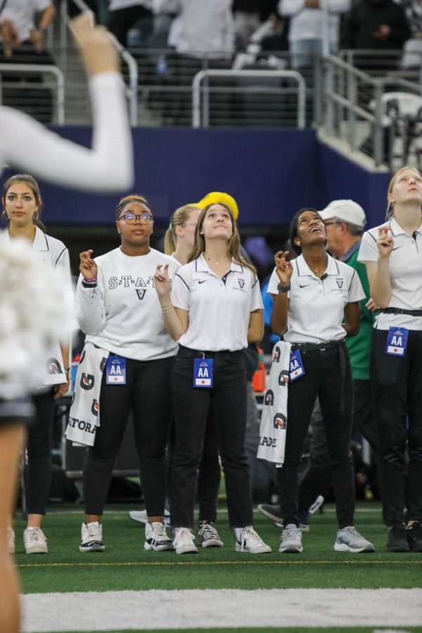 As introductions are made, the sports med team stands by in support.