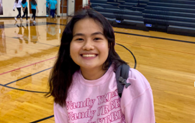as a junior, Kylie Pucong has taken on an editor role with the yearbook staff alongside two seniors.