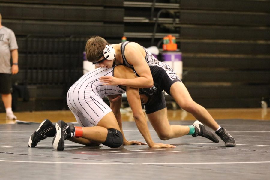 Wrestler competes in wrestle off in November. Wrestling will compete in their state competition in February.