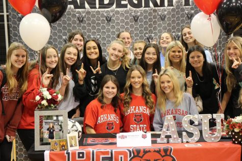 Kennedy Horn celebrates commitment with soccer teammates and friends.