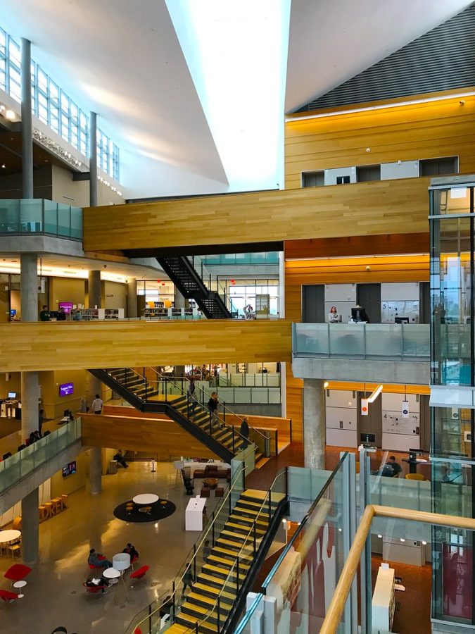 The Austin Public Library branch in down town Austin features thousands of books and small spaces for community learning opportunities.