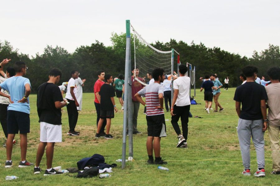 Junior Nazaf Ahmed and his friends play volleyball, one of the many activities at the Reuinion Ranch fair.