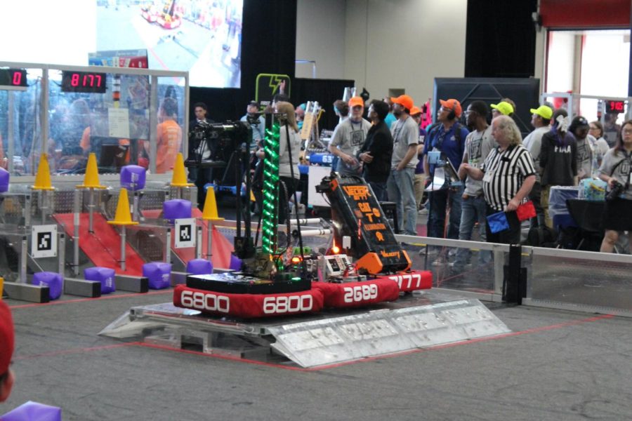 The Valor robot and its ally is set up on the playing field in preparation for the tournament.