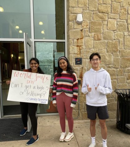 Students Riya Yarlagadda, Neha Poreddy, and Bryan Dam create activity to inspire happiness and compassion on campus.