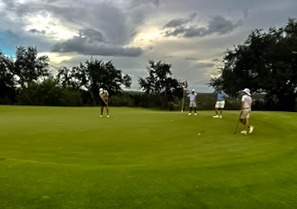 (From Left-to-Right) Jaxon Bandelier, Alex Mata, Connor Redmond, Miles Kritzer play at the UT Golf Club on the 15th green in the 3rd team qualifier of the season.