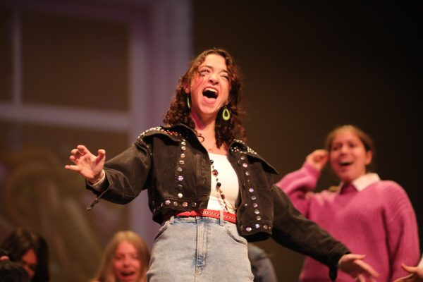 Senior Rachael Richman belts to the song Bend and Snap during a dress rehearsal for the Legally Blonde musical.