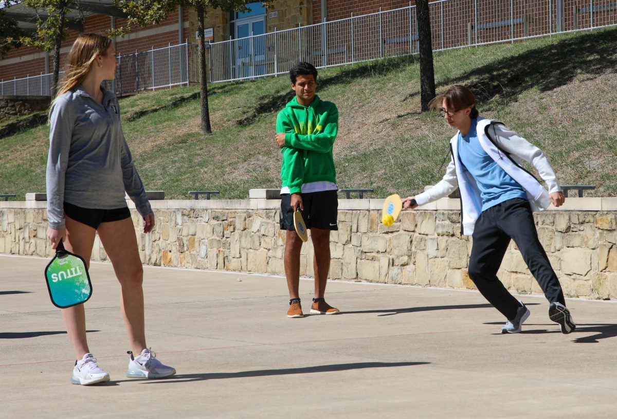 Pickleball Club, led by seniors and co-presidents Maya Bustami and Nikhil Richtermeyer, meets every other Monday for PIT and holds monthly Saturday socials. On Oct. 16, the club played during PIT for the first time by separating members into beginner levels and moving up to king/queen of the court. “Its amazing to see 18 year olds and 65 year olds battling it out on the court,” Susan King, sponsor, said. “I knew [pickleball] would be a great way we could connect [with] students, with Ms. Biddle and I beating them at Pickleball.”