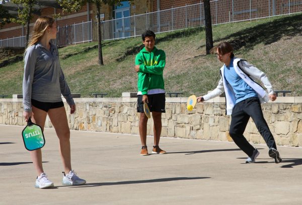 Pickleball Club, led by seniors and co-presidents Maya Bustami and Nikhil Richtermeyer, meets every other Monday for PIT and holds monthly Saturday socials. On Oct. 16, the club played during PIT for the first time by separating members into beginner levels and moving up to king/queen of the court. “Its amazing to see 18 year olds and 65 year olds battling it out on the court,” Susan King, sponsor, said. “I knew [pickleball] would be a great way we could connect [with] students, with Ms. Biddle and I beating them at Pickleball.”